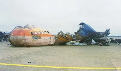 Wreckage of Singapore Airlines Flight 006 on the closed runway at Taipei.