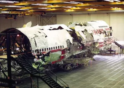 Recovered TWA Flight 800 wreckage assembled for the NTSB investigation, photographed in 1997.